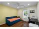 Bright bedroom with a stylish daybed and a view of the outdoors at 1812 Overrun St, Charleston, SC 29414