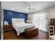 Beautiful bedroom with blue accent wall, ceiling fan, and natural lighting at 1812 Overrun St, Charleston, SC 29414