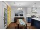 Kitchen and dining area with modern lighting and access to the back patio at 1812 Overrun St, Charleston, SC 29414