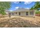Home backyard with patio, lawn, and exterior details at 1932 Staffwood Rd, Johns Island, SC 29455