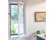 Kitchen featuring a large window overlooking a green outdoor space at 2 Live Oak Ave, Charleston, SC 29407