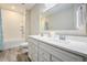 Bright bathroom with double vanity, a large mirror, and a shower-tub combo, creating a relaxing space at 200 Clearblue Loop, Summerville, SC 29486