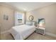 Light-filled bedroom features a comfy bed, stylish décor, and a window that brings in natural light at 200 Clearblue Loop, Summerville, SC 29486