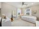 Cozy bedroom with a stylish daybed, decorative mirror, and a ceiling fan for added comfort at 200 Clearblue Loop, Summerville, SC 29486