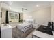 Bright bedroom with a large window, sleek desk, and stylish décor creating a modern, inviting space at 200 Clearblue Loop, Summerville, SC 29486