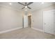 Bright bedroom featuring neutral walls, carpet, and a modern ceiling fan and white trim at 200 Clearblue Loop, Summerville, SC 29486