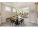 Cozy dining area with a round table, pendant light, and views to the living room with comfortable seating at 200 Clearblue Loop, Summerville, SC 29486