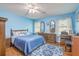 Bright bedroom with hardwood floors, ceiling fan and natural light at 201 Hunt Club Dr, Summerville, SC 29485