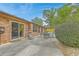 Back patio of the home with seating and trees at 201 Hunt Club Dr, Summerville, SC 29485