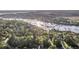 Aerial view showcasing waterfront homes, private docks, and serene waterways surrounded by lush landscapes at 2037 Shell Ring Cir, Mount Pleasant, SC 29466