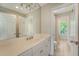 Bathroom with white vanity, large mirror, and separate toilet room at 2037 Shell Ring Cir, Mount Pleasant, SC 29466