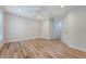 A bright, spacious bedroom featuring hardwood floors, a ceiling fan, recessed lighting, and access to other rooms at 2037 Shell Ring Cir, Mount Pleasant, SC 29466
