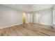 Large bedroom featuring hardwood floors and multiple closets at 2037 Shell Ring Cir, Mount Pleasant, SC 29466