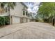 Three car garage with basketball hoop and a large driveway for plenty of parking at 2037 Shell Ring Cir, Mount Pleasant, SC 29466