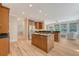 Spacious kitchen with granite countertops, wood cabinetry, stainless steel appliances, and an open layout at 2037 Shell Ring Cir, Mount Pleasant, SC 29466