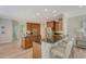 Spacious kitchen features wood cabinets, hardwood floors, stainless steel appliances, granite countertops, and bar seating at 2037 Shell Ring Cir, Mount Pleasant, SC 29466