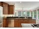 This kitchen features wood cabinets, stainless steel appliances, granite countertops, and a breakfast nook at 2037 Shell Ring Cir, Mount Pleasant, SC 29466