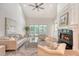 Bright living room featuring a fireplace, ceiling fan, hardwood floors and lots of natural light at 2037 Shell Ring Cir, Mount Pleasant, SC 29466