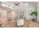 Bright living room featuring a vaulted ceiling, hardwood floors and lots of natural light at 2037 Shell Ring Cir, Mount Pleasant, SC 29466