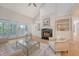 Bright living room featuring a fireplace, ceiling fan, hardwood floors and lots of natural light at 2037 Shell Ring Cir, Mount Pleasant, SC 29466