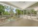 Covered porch with picturesque views of a lush backyard and pool area, perfect for relaxation and entertainment at 2037 Shell Ring Cir, Mount Pleasant, SC 29466