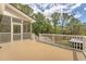 Expansive porch with a railing and an area that provides a perfect transition to the natural landscape beyond at 2037 Shell Ring Cir, Mount Pleasant, SC 29466