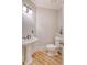 Bright powder room featuring a hardwood floors and traditional fixtures at 2037 Shell Ring Cir, Mount Pleasant, SC 29466