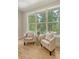 Bright sitting area featuring hardwood floors and lots of natural light at 2037 Shell Ring Cir, Mount Pleasant, SC 29466