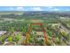 Scenic aerial shot of land with mature trees and a red border to indicate property lines at 2080 Sniders Hwy, Walterboro, SC 29488