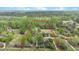 Aerial view outlines property lines, revealing ample space and lush, mature trees for privacy at 2080 Sniders Hwy, Walterboro, SC 29488