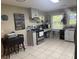 Spacious kitchen featuring modern appliances, ample counter space, and lots of storage, creating a functional and inviting space at 210 Ellen St, Goose Creek, SC 29445