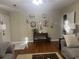 Bright living room with hardwood floors, comfortable sofas, and stylish decor, perfect for Gathering gatherings and entertaining at 210 Ellen St, Goose Creek, SC 29445