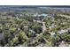 Beautiful aerial view of neighborhood with lush trees surrounding a beautiful lake at 2104 Royal Pine Dr, Seabrook Island, SC 29455