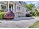 A spacious three car garage, with well maintained landscaping at 2104 Royal Pine Dr, Seabrook Island, SC 29455