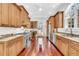 Gourmet kitchen features stainless steel appliances and custom wood cabinetry at 2104 Royal Pine Dr, Seabrook Island, SC 29455