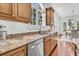 Modern kitchen with stainless appliances, granite countertops, and hardwood flooring at 2104 Royal Pine Dr, Seabrook Island, SC 29455