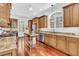 Modern kitchen with stainless steel appliances, custom cabinets, and center island at 2104 Royal Pine Dr, Seabrook Island, SC 29455