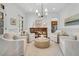 Bright and airy living room with fresh, neutral decor and lots of natural light at 2104 Royal Pine Dr, Seabrook Island, SC 29455