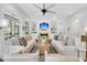 Comfortable living room with a fireplace, built-in shelves, and neutral tones at 2104 Royal Pine Dr, Seabrook Island, SC 29455