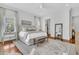 A spacious main bedroom with a walk-in closet and wood floors at 2104 Royal Pine Dr, Seabrook Island, SC 29455