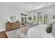A spacious main bedroom with a large window and a dresser at 2104 Royal Pine Dr, Seabrook Island, SC 29455