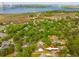 Aerial view showcasing the home's proximity to a waterway and the surrounding neighborhood at 217 7Th Ave, Mount Pleasant, SC 29464
