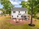 Expansive backyard features a fire pit, lawn, seating, and an outdoor entertaining area at 217 7Th Ave, Mount Pleasant, SC 29464
