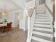 Inviting foyer view with staircase, dining room and kitchen at 217 7Th Ave, Mount Pleasant, SC 29464