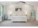 Spacious main bedroom with neutral walls, carpet, vaulted ceiling and bright sunny windows at 217 7Th Ave, Mount Pleasant, SC 29464