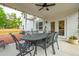 Relaxing screened-in patio with outdoor dining set and access to a backyard entertainment area at 217 7Th Ave, Mount Pleasant, SC 29464