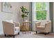 Sitting area featuring two comfortable chairs and a table at 217 7Th Ave, Mount Pleasant, SC 29464