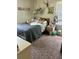 Cozy bedroom featuring a double bed, bedside table, and bright natural light at 240 Kerrison St, Varnville, SC 29944