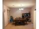 Formal dining room featuring a chandelier and space for six to dine comfortably at 240 Kerrison St, Varnville, SC 29944