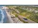 Beautiful aerial view of the beach, water, and surrounding marshland at 2530 Jasper Blvd, Sullivans Island, SC 29482
